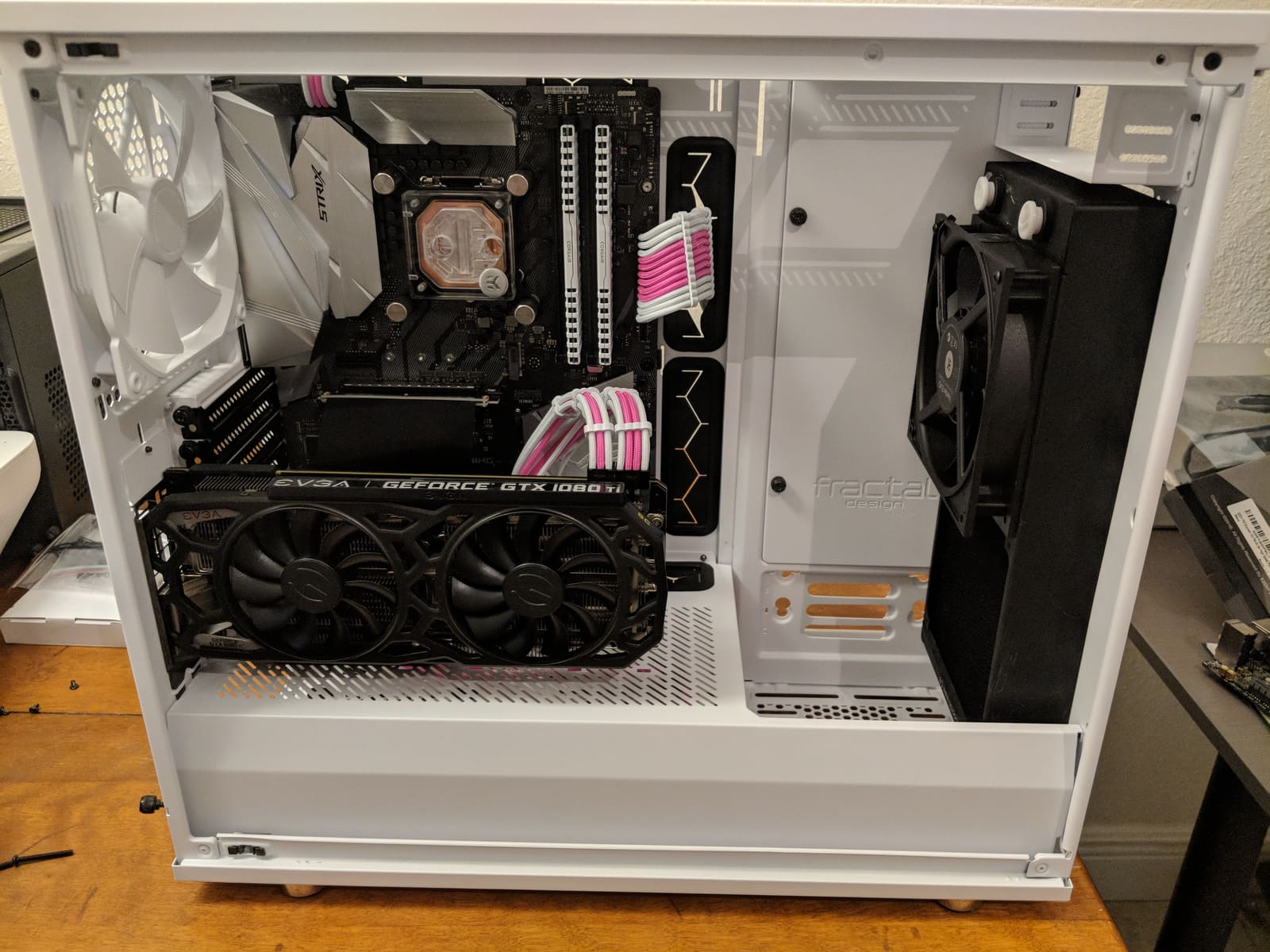 The white Fractal Design Define R6 during the dry fit, with the air-cooled GPU still installed and the radiator mounted at the front